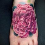 peonies tattoo on her ankle - great photo of the finished tattoo 2