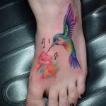 tattoo on her ankle Hummingbird 1