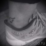 tattoo on her ankle men - cool photo of the finished tattoo 1