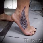 tattoo on her ankle wings - great photo of the finished tattoo 1