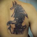 Anubis tattoo on his back - tattoos photo for an article about the importance of 2