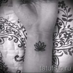 Lilie Tattoo auf dem Arm - eine Tätowierung des Foto Beispiel 13072016 1