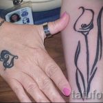 Lilie Tattoo auf dem Arm - eine Tätowierung des Foto Beispiel 13072016 3