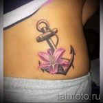 Lilie Tattoo auf dem unteren Rücken - Foto Beispiel der Tätowierung 13072016 2