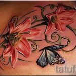 Lilie Tattoo mit Schmetterling - Foto Beispiel für die Tätowierung 13072016 1
