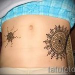Sonne Tattoo auf dem Bauch - ein kühles Foto des fertigen Tätowierung 14072016 3