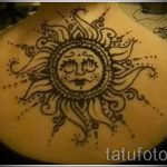 Sonne mit einem Gesicht Tattoo - ein cooles Foto des fertigen Tätowierung auf 14072016 2