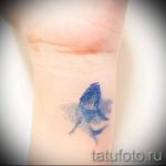 Whale tattoo on her wrist - a photo of the finished version of the tattoo 14072016 2