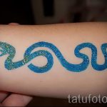 glitter tattoo on his arm - Photo example of 24072016 2