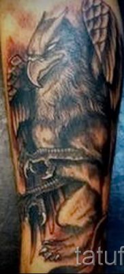 griffin tattoo on his forearm — photos for an article about the importance of 1