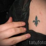 heraldic lily tattoo - Photo example of the tattoo 13072016 2