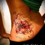 lily tatouage sur le bas du dos - exemple photo du tatouage 13072016 1