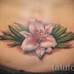 lily tatouage sur le bas du dos - exemple photo du tatouage 13072016 2