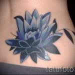 lily tatouage sur le bas du dos - exemple photo du tatouage 13072016 3