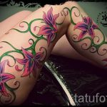 lily tattoo on his leg - Photo example of the tattoo 13072016 1