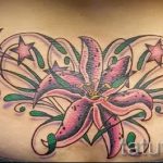 lily tattoo on the lower back - Photo example of the tattoo 13072016 1