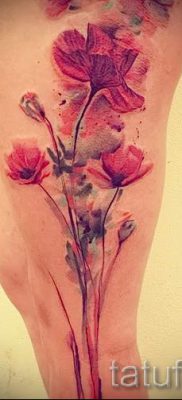 poppy tattoo on his leg — photos for an article about the importance of tattoos 1