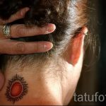 soleil tatouage sur son cou - une photo fraîche du tatouage fini 14072016 1