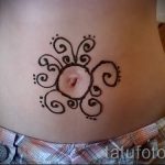 sun tattoo bellybutton - a cool photo of the finished tattoo 14072016 2