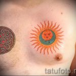 sun tattoo on his chest - a cool photo of the finished tattoo 14072016 5