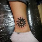 sun tattoo on his leg - a cool photo of the finished tattoo 14072016 5