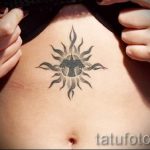 sun tattoo on his stomach - a cool photo of the finished tattoo 14072016 3