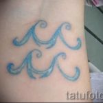 Aquarius sign tattoo pictures - an example of the finished tattoo 01082016 1002 tatufoto.ru