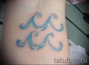 Aquarius sign tattoo pictures - an example of the finished tattoo 01082016 1002 tatufoto.ru