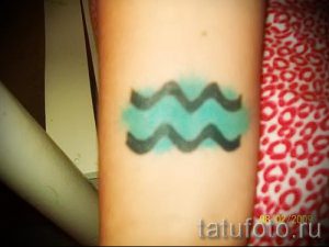 Aquarius symbol tattoo - photo - an example of the finished tattoo 01082016 1006 tatufoto.ru