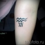 Aquarius symbole tatouage - photo - un exemple du tatouage fini 01082016 1008 tatufoto.ru