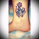 Aquarius tatouage sur sa jambe - une photo - un exemple du tatouage fini 01082016 1014 tatufoto.ru