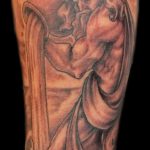 Aquarius tatouage sur son avant-bras - photo - un exemple du tatouage fini 01082016 1015 tatufoto.ru