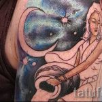 Aquarius tattoo on his arm - photo - an example of the finished tattoo 01082016 2027 tatufoto.ru