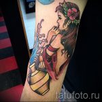 Aquarius tattoo on his forearm - photo - an example of the finished tattoo 01082016 2029 tatufoto.ru