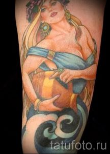Aquarius tattoo on his forearm - photo - an example of the finished tattoo 01082016 4031 tatufoto.ru