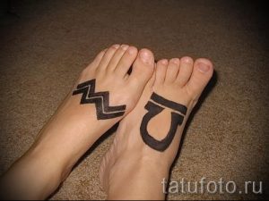 Aquarius tattoo on his leg - a photo - an example of the finished tattoo 01082016 1032 tatufoto.ru