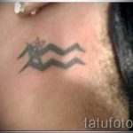 Aquarius tattoo on his neck - a photo - an example of the finished tattoo 01082016 1035 tatufoto.ru