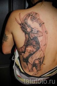 Aquarius tattoo on his shoulder - a photo - an example of the finished tattoo 01082016 1037 tatufoto.ru