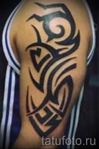 Photo - tatouage tribal sur son bras - un exemple pour un article sur l'importance de 1021 tatufoto.ru