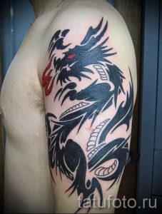 Photo - tribal tattoo dragon - an example for an article about the importance of 1026 tatufoto.ru