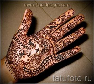 mehendi on a hand bird - Picture temporary henna tattoo 1087 tatufoto.ru