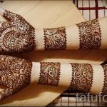 mehendi on her arm bracelet - Picture temporary henna tattoo 3119 tatufoto.ru