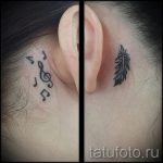 notes tattoo behind the ear - the photo of the finished tattoo on 02082016 1010 tatufoto.ru