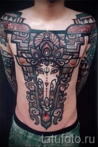 photo - cool tattoo on his chest for men - an example 1065 tatufoto.ru