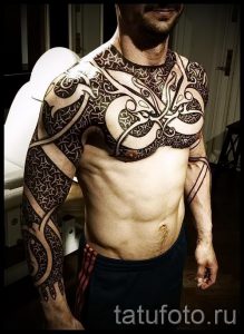 pictures - tattoos in tribal style - an example for an article about the importance of 1034 tatufoto.ru