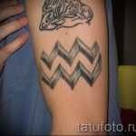 tattoo in the form of Aquarius - photo - an example of the finished tattoo 01082016 1049 tatufoto.ru