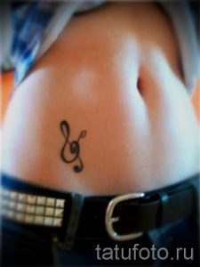 tattoo notes on his stomach - a photo of the finished tattoo 02082016 1057 tatufoto.ru