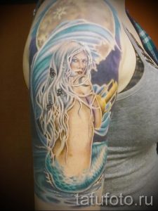 тату водолей на руке - фото - пример готовой татуировки от 01082016 8145 tatufoto.ru
