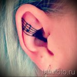 тату ноты в ухе - фото готовой татуировки от 02082016 3084 tatufoto.ru