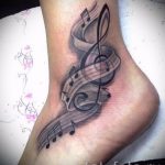 тату ноты на ноге - фото готовой татуировки от 02082016 3154 tatufoto.ru